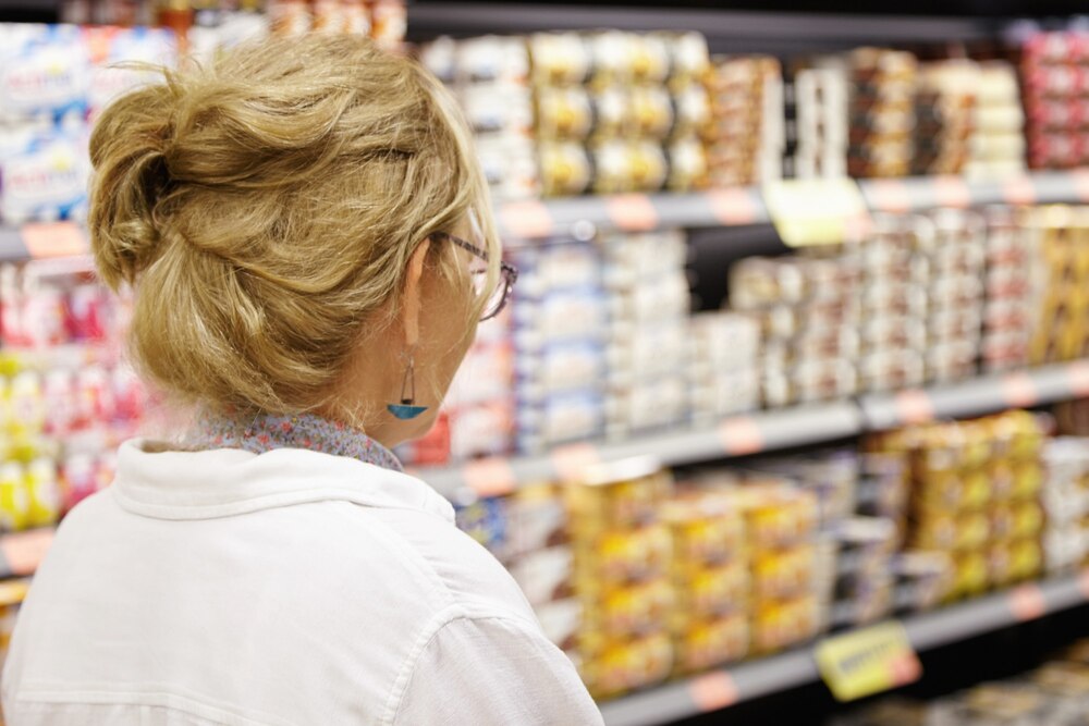 Elderly woman in supermarket